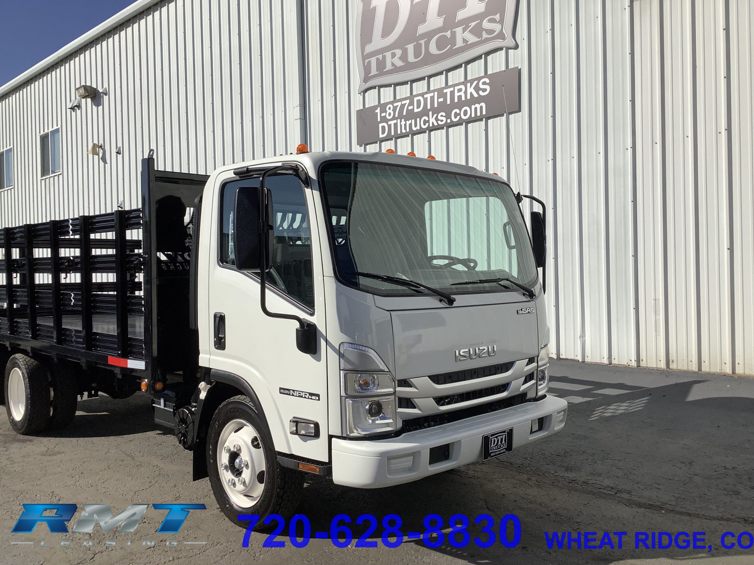 2024 Isuzu NPR-HD Flatbed - image 1 of 6